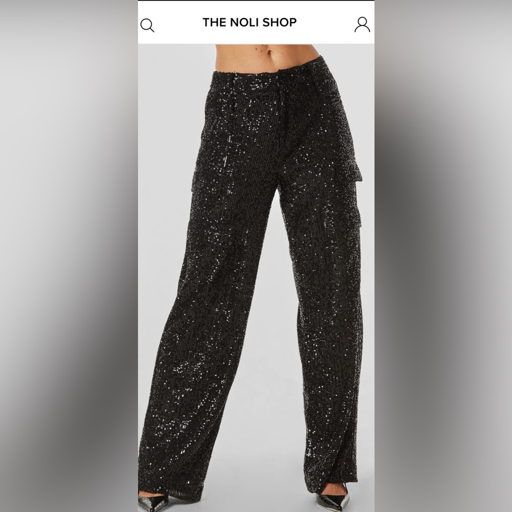 The Noli Shop black sequin cargo pants. New with tags.